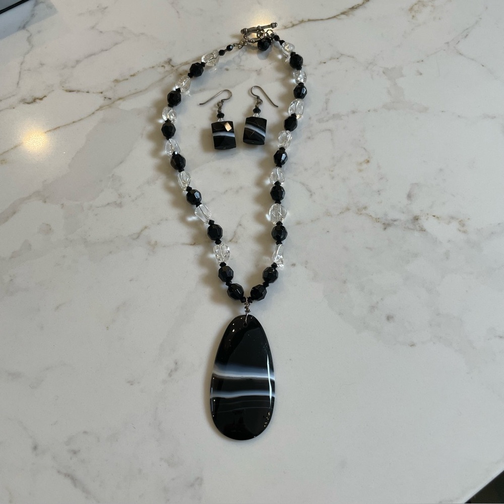 Beautiful fashion jewelry set. Earrings and necklace. Would make a great gift!